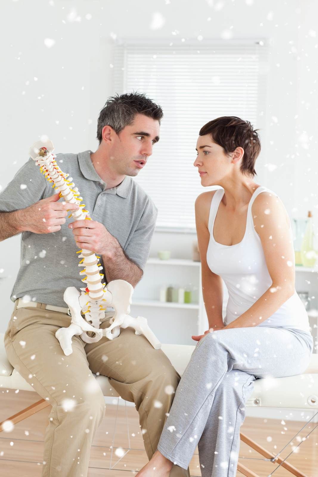 29096738_woman-listening-to-her-chiropractor Client working with their Physiotherapist in DC Physiotherapy Clondalkin, Expert Physio Clondalkin